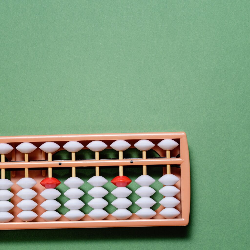 Japanese traditional abacus soroban isolated on white background